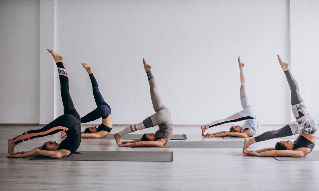 Yoga group classes inside the gym